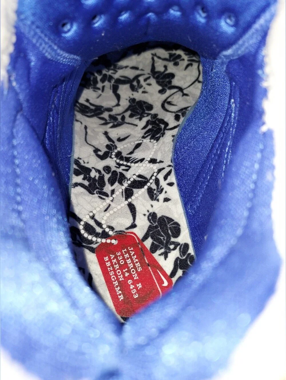 Nike Men’s White Floral Training Shoes with Black Print and Blue Details
